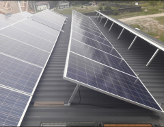 Installation of a solar photovoltaic module on a flat roof, kW